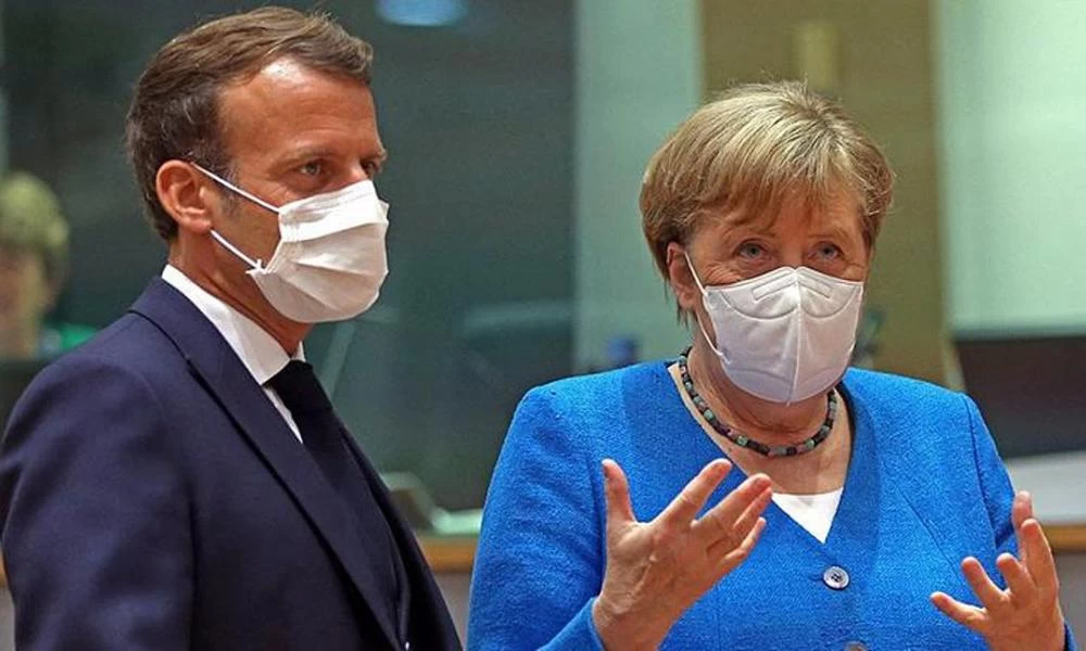 Πιθανή συνεργασία για τα εμβόλια συζήτησαν Μακρόν, Μέρκελ και Πούτιν